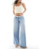 Hollister Hollister curvy low rise super baggy raw hem jeans in light wash-Blue - 1