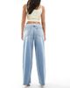Hollister Hollister curvy low rise super baggy raw hem jeans in light wash-Blue - 3
