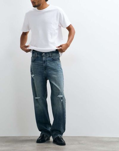 Hollister Hollister super baggy fit jeans with distressed detailing in dirty-blue wash