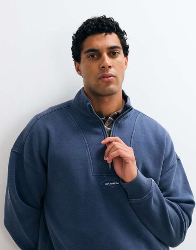 Hollister Hollister surf logo 1/4 zip sweatshirt in washed blue