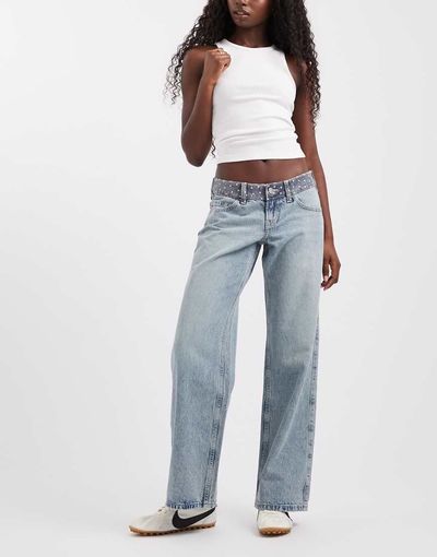 Hollister Hollister ultra low rise baggy fit jeans with polka dot waistband detail in light blue wash
