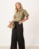 JDY Petite JDY Petite textured wide leg pants in black - 1