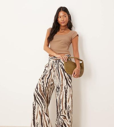 JDY Petite JDY Petite wide leg pants in abstract zebra print-White