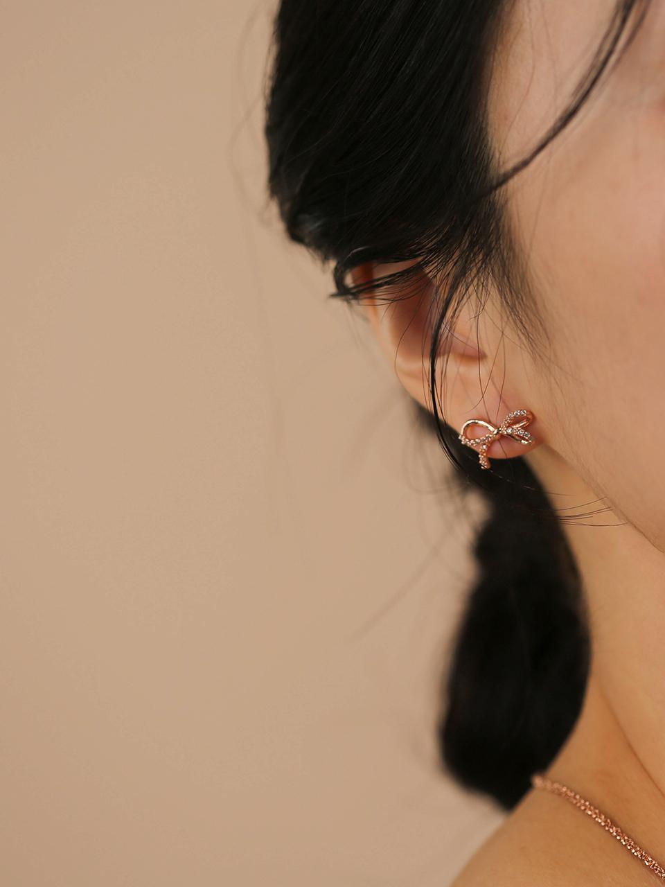 JUDY AND PAUL Diana Twist Ribbon Rose Gold Earrings