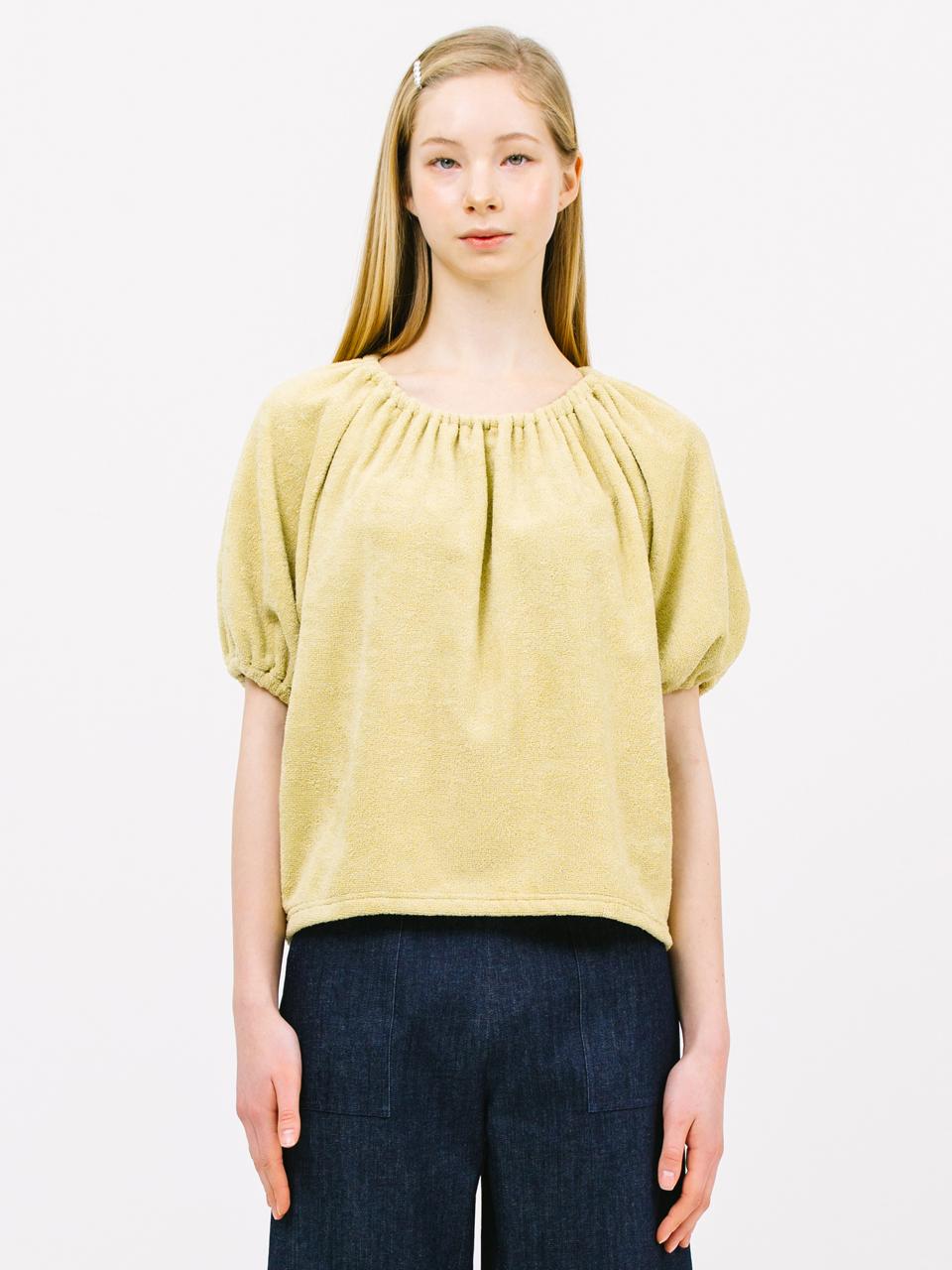 Jun by Jun k. boucle string top