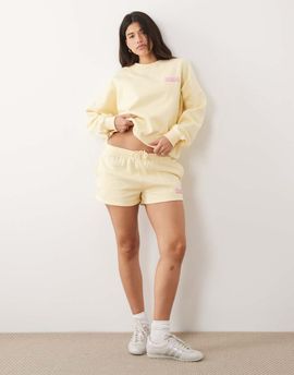 Kaiia Kaiia cotton rich contrast printed logo sweatshirt fabric mini shorts in lemon & pink - part of a set-Yellow