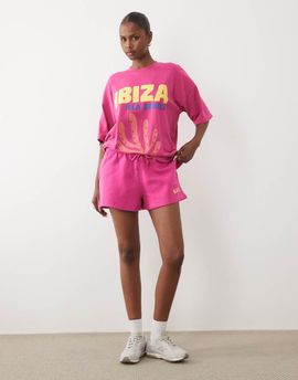 Kaiia Kaiia cotton rich embroidered logo mini sweat shorts in hot pink and orange - part of a set