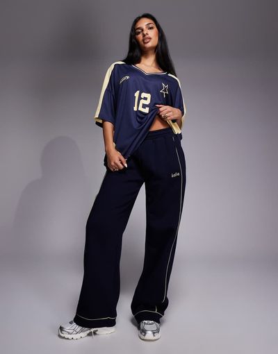 Kaiia Kaiia embroidered logo wide leg sweatpants in navy and yellow - part of a set-Multi