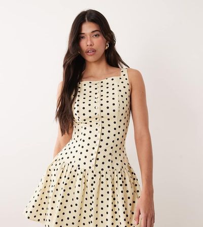 Kaiia Kaiia exclusive high square neck button front gathered skirt mini dress in yellow and black polka dots