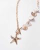 Kaiia Kaiia exclusive pearlescent shell chain starfish charm necklace in gold - 2