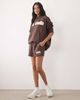 Kaiia Kaiia Studio cotton rich embroidered logo sweat shorts in brown & yellow - part of a set - 1