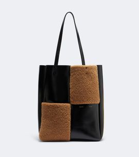 Khaite Khaite Zoe Medium shearling paneled tote bag