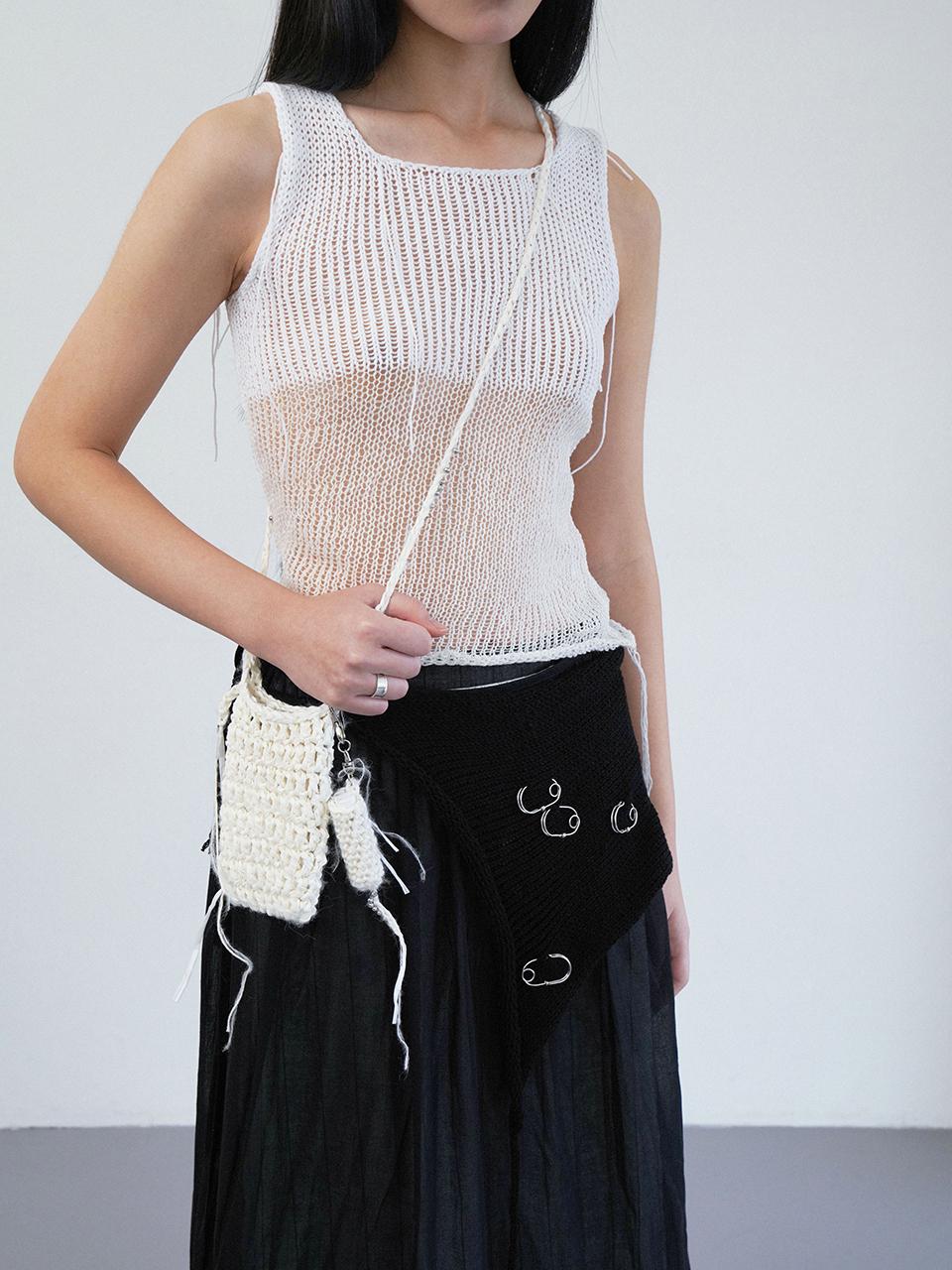 Kindred knitted phone bag in white