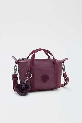 Kipling Kipling Art Compact Crossbody Bag in Grape Wine Metallic, Women's at Urban Outfitters