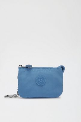 Kipling Kipling Mini Creativity Charm Keychain in Vintage Blue at Urban Outfitters