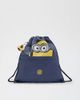 Kipling Kipling Minions Supertaboo Drawstring Backpack in Dungaree Blue at Urban Outfitters - 1
