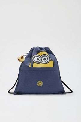 Kipling Kipling Minions Supertaboo Drawstring Backpack in Dungaree Blue at Urban Outfitters