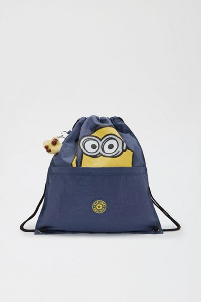 Kipling Kipling Minions Supertaboo Drawstring Backpack in Dungaree Blue at Urban Outfitters