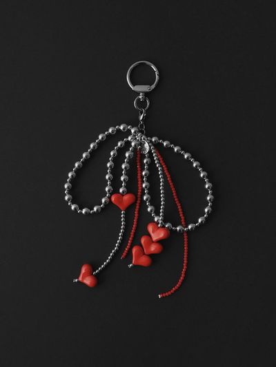 KWANI Silver Bow with Red Hearts
