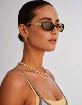 Le Specs Le Specs Lunita oval sunglasses in black with brown lens