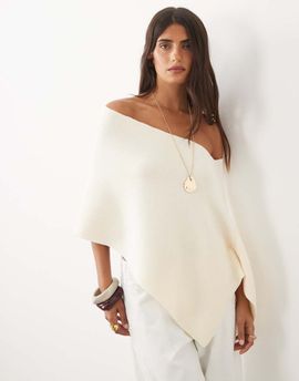 Lioness Lioness Luminous knitted asymmetric poncho in white