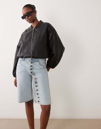Lioness Lioness Penny exclusive asymmetric button detail relaxed leg jorts in light wash denim-Blue