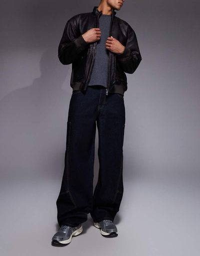 Liquor N Poker Liquor N Poker baggy spliced side pocket jeans in black