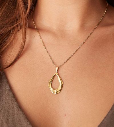 LOST SOULS Lost Souls stainless steel 18ct gold plated statement molten pendant necklace