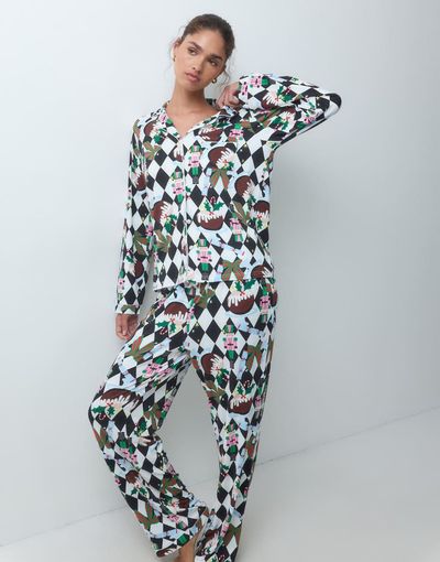 Loungeable Loungeable Christmas rever button up shirt and trouser pyjama set in mono nutcracker check-MULTI