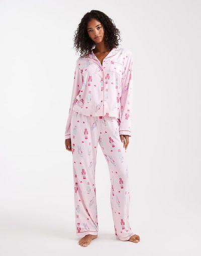 Loungeable Loungeable Christmas super soft jersey camp collar top and wide leg pants pajama set in pink nutcracker print