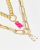 Madein. Madein chunky chain necklace in gold with a pink and white gummy bear charm - 2