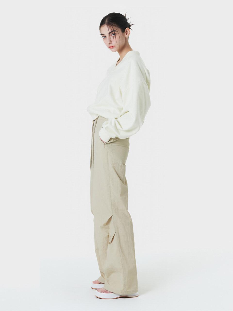 MAKE A TOAST TWO-TUCK STRING SLIM WIDE PANTS BEIGE MBCSPA002BE