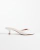 Mango Mango faux leather bow detail heeled mules in white - 1