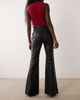Mango Mango flared leather look pants in black - 3