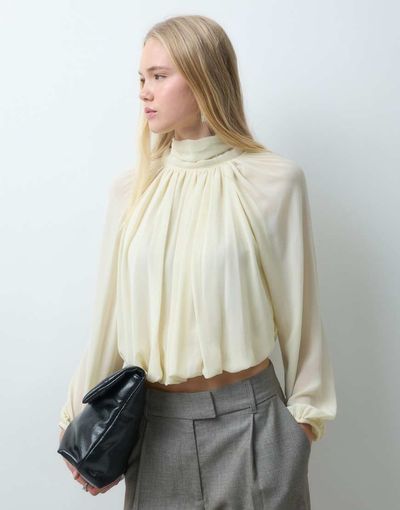 Mango Mango high neck puff sleeve blouse in off white