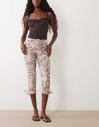 Miss Selfridge Miss Selfridge denim capri with bows in animal print-Multi