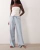 Miss Selfridge MIss Selfridge denim pull on pants with contrast stitch in light wash-Blue - 1