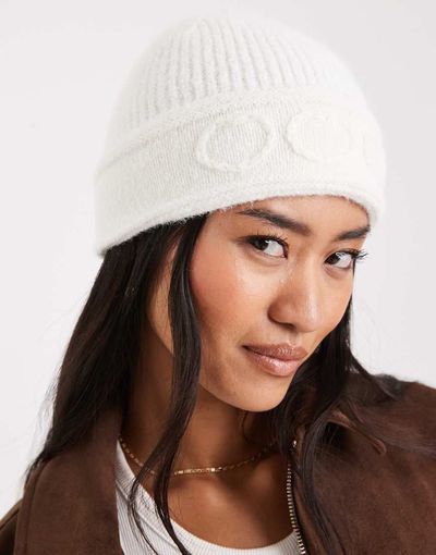 Miss Selfridge Miss Selfridge embroidered hearts knit beanie in cream-White