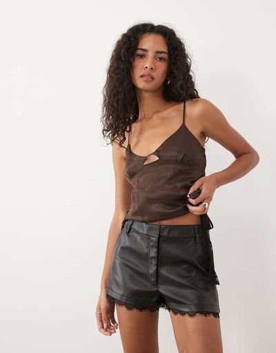 Miss Selfridge Miss Selfridge faux leather lace hem micro shorts in black