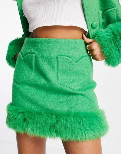 Miss Selfridge Miss Selfridge heart pocket faux fur trim mini skirt in green - part of a set