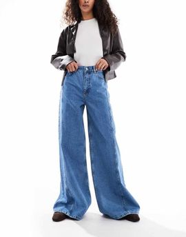 Miss Selfridge Miss Selfridge seam detail flared jeans in mid wash-Blue