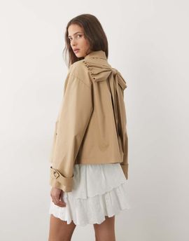 Miss Selfridge Miss Selfridge short trench coat with bow back detail in tan-Neutral