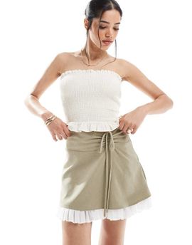 Miss Selfridge Miss Selfridge tailored ruffle hem mini skirt in olive-Black