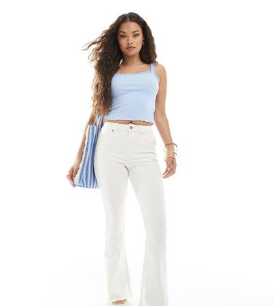 Miss Selfridge Petite Miss Selfridge Petite heart pocket flare jeans in ecru wash-White