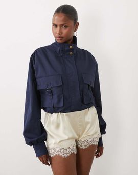 Missyempire Missyempire funnel neck buckle detail balloon sleeve jacket in dark wash blue-Navy