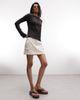 Monki Monki cotton cargo mini skirt with pockets in off white - 3