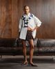 Monki Monki pleated mini skirt with frayed edge and pocket detail in brown stripe - 1