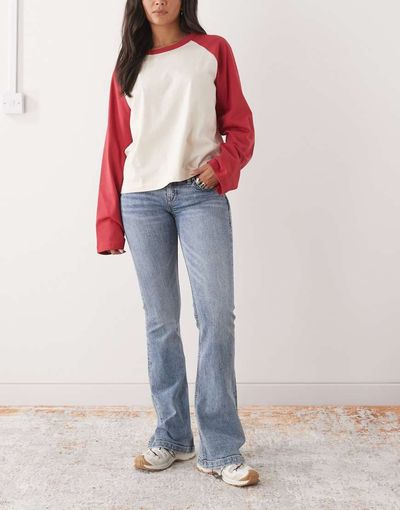 Monki Monki pocket detail flared jeans in denim blue wash