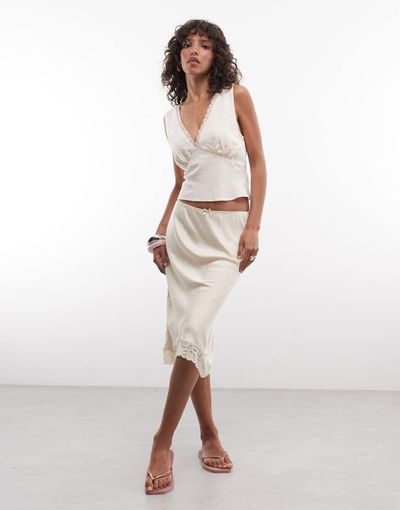 Monki Monki satin look lace midi skirt in beige-Neutral