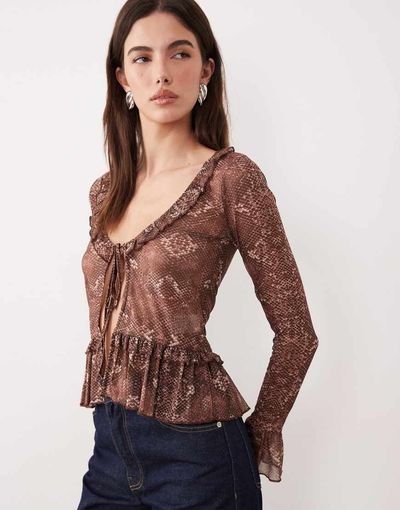 Motel Motel long sleeve snake skin ruffle edged top in brown